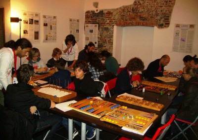 [:en]Ludyssey – Mathematical journey through ancient games[:it]Ludyssea – Viaggio matematico tra i giochi antichi[:fr]Ludyssée – Voyage à travers les jeux du monde[:eo]Ludyssea – Viaggio matematico tra i giochi antichi[:la]Ludyssea – Viaggio matematico tra i giochi antichi[:]